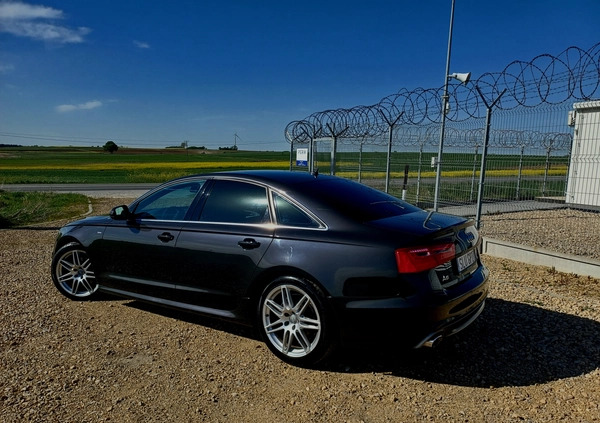 Audi A6 cena 59999 przebieg: 240000, rok produkcji 2012 z Woźniki małe 46